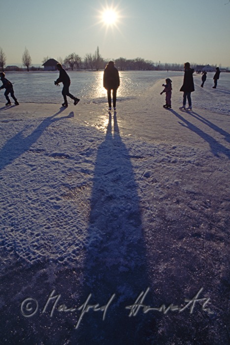 Eisläufer auf dem See