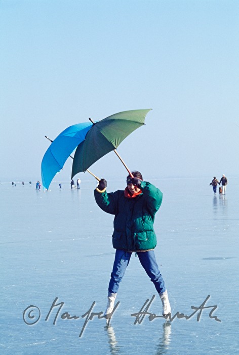 Eisläufer auf dem See