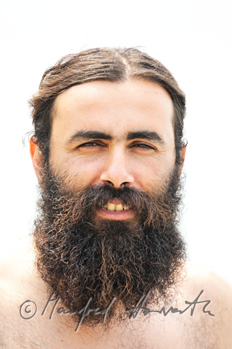 griechischer Mann auf dem Strand