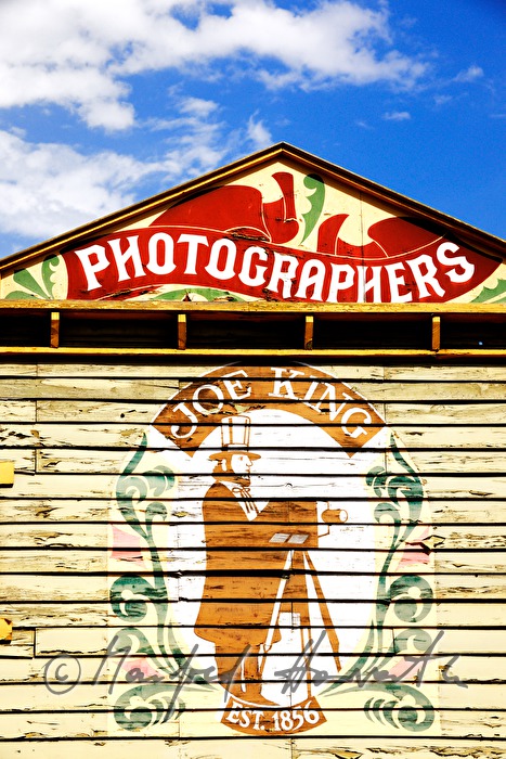 Logo eines Fotografen in der Westernstadt