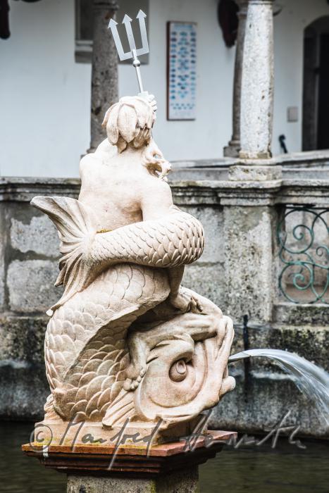Barocke Statue des Neptun im Fischkalter
